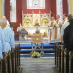 Fr Tom rests before the Altar