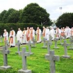 60 priests lead the procession to the grave 2