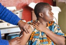 Planned exclusion of refugees from vaccination